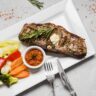 Carnivore Diet Recipes Easy and Delicious Meal Ideas ## Introduction The carnivore diet is a high-protein, low-carb eating plan that focuses exclusively on animal-based foods. This diet has gained popularity among health-conscious individuals, students, older adults, office-goers, and fitness enthusiasts in the USA. Many people follow the carnivore diet to improve digestion, boost energy, and maintain a lean physique. In this guide, we will explore easy carnivore diet recipes, the best foods to include, and meal ideas for breakfast and dinner. Whether you're new to this diet or looking for inspiration, these carnivore-friendly recipes will keep you satisfied and energized. --- ## What is the Carnivore Diet The carnivore diet eliminates plant-based foods and focuses solely on meat, fish, eggs, and dairy. Some people also include animal fats, bone broth, and organ meats for added nutrition. ### Carnivore Diet Food List - Meat Beef, pork, lamb, chicken, turkey - Fish & Seafood Salmon, tuna, shrimp, sardines - Eggs Whole eggs, omelets, scrambled eggs - Dairy Cheese, butter, heavy cream - Fats Tallow, lard, ghee, bone marrow This diet is high in protein and fats, making it an excellent choice for those aiming to lose weight or build muscle. --- ## Easy Carnivore Diet Recipes ### 1. Carnivore Diet Breakfast Recipes #### A. Scrambled Eggs with Beef Tallow Ingredients - 3 large eggs - 1 tbsp beef tallow - Salt to taste Instructions 1. Heat beef tallow in a pan over medium heat. 2. Whisk eggs in a bowl and pour into the pan. 3. Stir continuously until eggs are soft and cooked. 4. Season with salt and serve hot. #### B. Bacon and Egg Muffins Ingredients - 6 eggs - 6 bacon strips - 12 cup shredded cheese Instructions 1. Preheat oven to 375°F (190°C). 2. Line muffin cups with bacon strips. 3. Crack an egg into each cup and sprinkle cheese on top. 4. Bake for 15 minutes or until eggs are firm. 5. Let cool and enjoy! --- ## Carnivore Diet Dinner Recipes ### 2. Ribeye Steak with Garlic Butter Ingredients - 1 ribeye steak - 1 tbsp butter - 1 clove garlic, minced - Salt and pepper Instructions 1. Season steak with salt and pepper. 2. Heat a skillet over high heat and cook steak for 3-4 minutes per side. 3. Add butter and garlic to the pan, basting the steak. 4. Remove from heat and let it rest for 5 minutes before serving. ### 3. Crispy Chicken Thighs Ingredients - 4 chicken thighs - 2 tbsp butter - Salt to taste Instructions 1. Preheat oven to 400°F (200°C). 2. Rub chicken thighs with butter and sprinkle salt. 3. Place on a baking sheet and bake for 35-40 minutes until crispy. 4. Serve hot with melted butter. --- ## Health Benefits of the Carnivore Diet Following a carnivore diet offers several health benefits - Weight loss High protein intake helps in fat loss. - Improved digestion Eliminates fiber-related bloating. - Increased energy Provides long-lasting fuel for the body. - Better mental clarity Reduces brain fog and enhances focus. ### External Resources - [Benefits of High-Protein Diets](httpswww.healthline.com) - [Understanding the Carnivore Diet](httpswww.medicalnewstoday.com) - [Why Meat is Essential for Nutrition](httpswww.ncbi.nlm.nih.gov) - [Scientific Research on Low-Carb Diets](httpswww.webmd.com) --- ## Frequently Asked Questions (FAQs) ### 1. Can I drink coffee on the carnivore diet Most strict carnivore dieters avoid coffee, but some allow it in moderation. ### 2. How much protein should I eat daily Aim for 0.8 to 1.2 grams of protein per pound of body weight. ### 3. Can I eat dairy on a carnivore diet Yes, but stick to low-lactose options like cheese, butter, and heavy cream. ### 4. Is the carnivore diet safe long-term While many experience benefits, consult a doctor before making long-term dietary changes. --- ## Conclusion The carnivore diet is a simple yet effective way to enhance your health through nutrient-dense, animal-based foods. With these easy carnivore diet recipes, you can enjoy delicious meals that fit your lifestyle. Whether you prefer steaks, eggs, or crispy chicken, there's always a tasty option to try. Carnivore Diet Recipes
